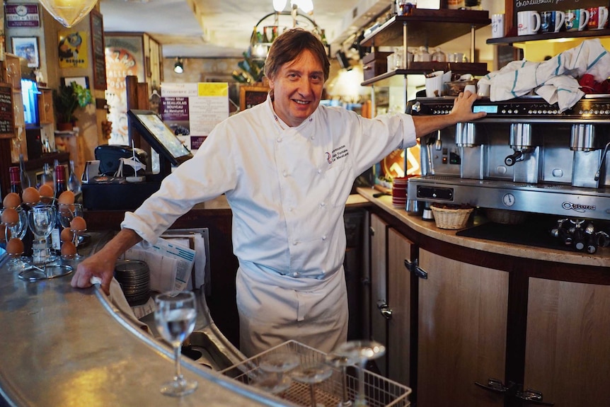 Chef and bistro owner Alain Fontain at the bar.