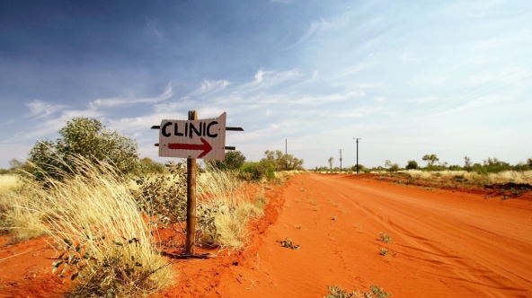 homemade sign for a medical clinic in the middle of the desert