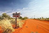 homemade sign for a medical clinic in the middle of the desert