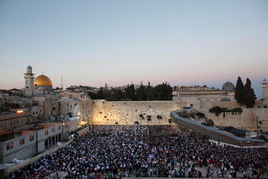 Israelis take part in a mass prayer at the Western Wall in Jerusalem