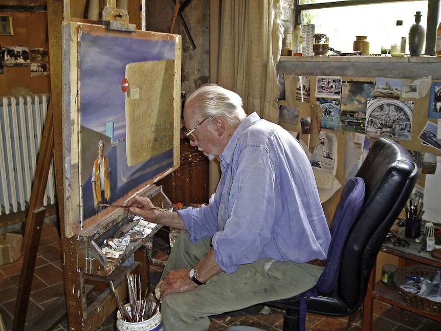 Jeffrey Smart paints in his studio