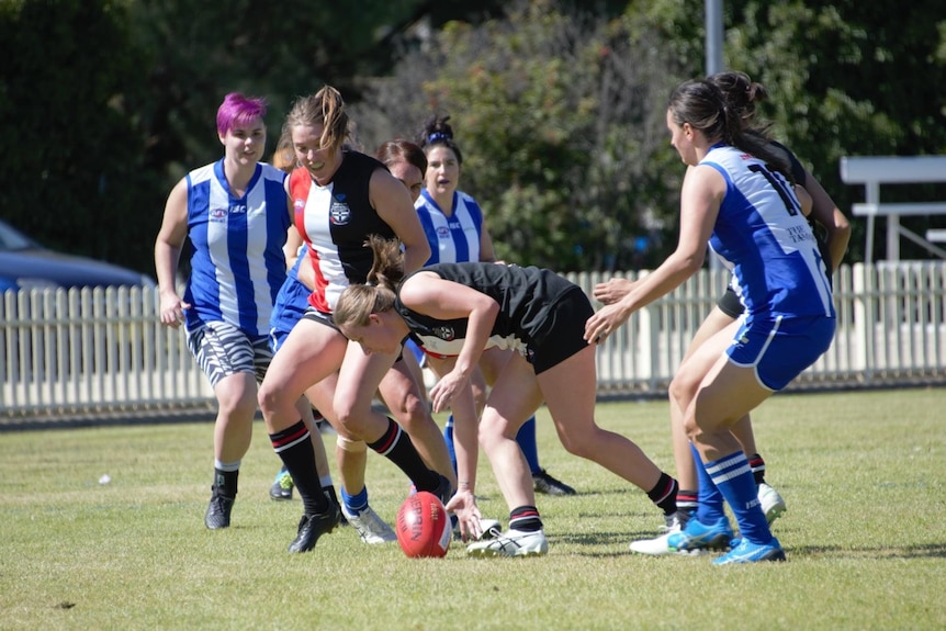 women playing australian football