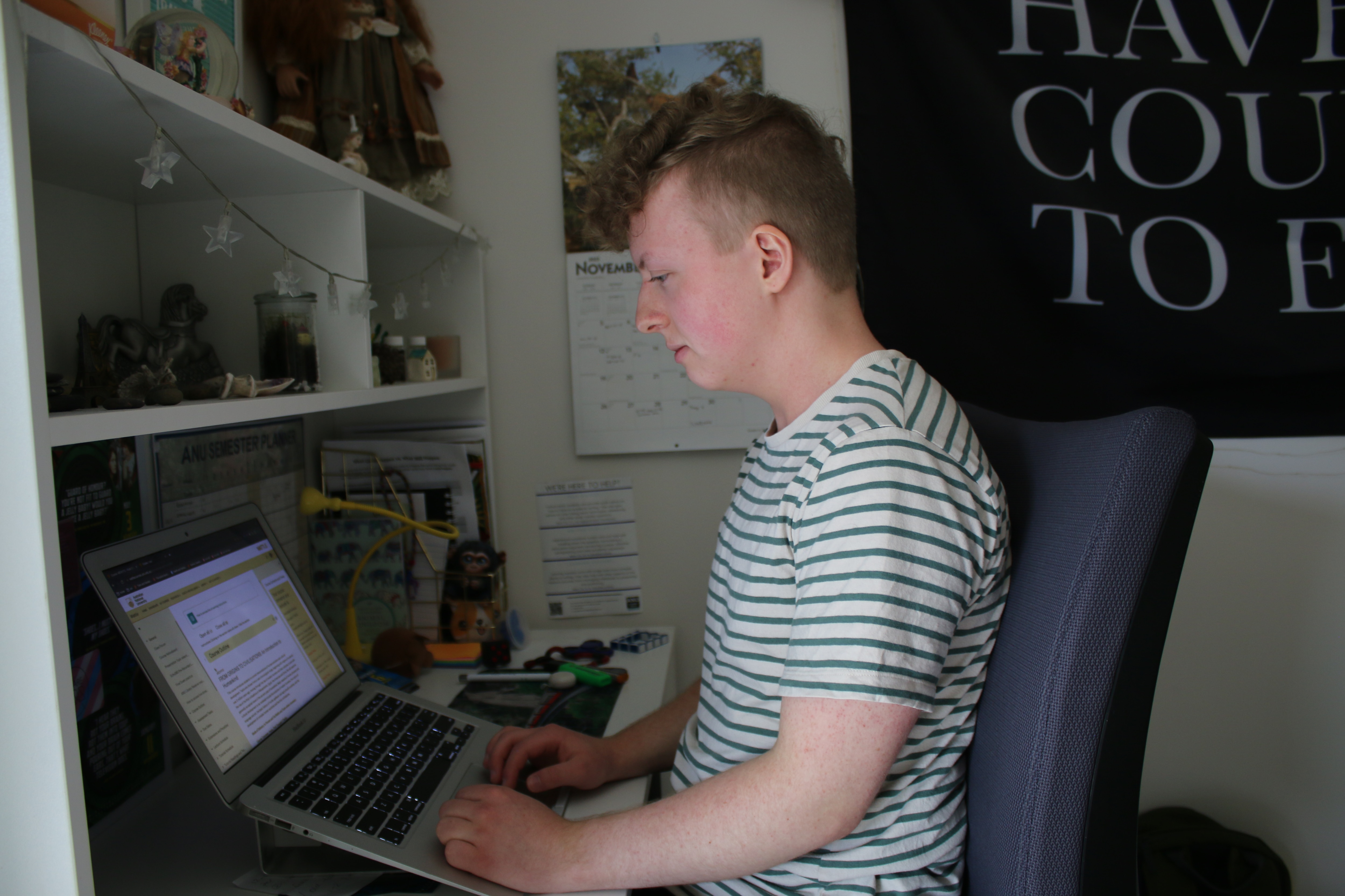 18-year-old autistic student Connor Winfield studies at a computer.