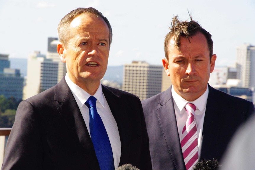 Bill Shorten and Mark McGowan with Perth city buildings in the background.