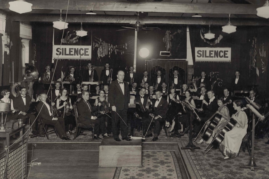 Percy Code conducting the Australian Broadcasting Corporation orchestra.