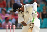 Dravid looks back after being bowled