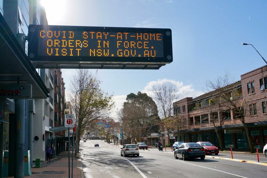 An electronic sign reminding motorists of the COVID-19 lockdown orders in Sydney.