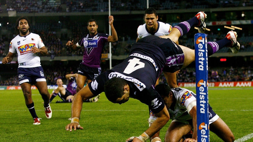 Triple treat: Inglis crosses for his first of three tries.