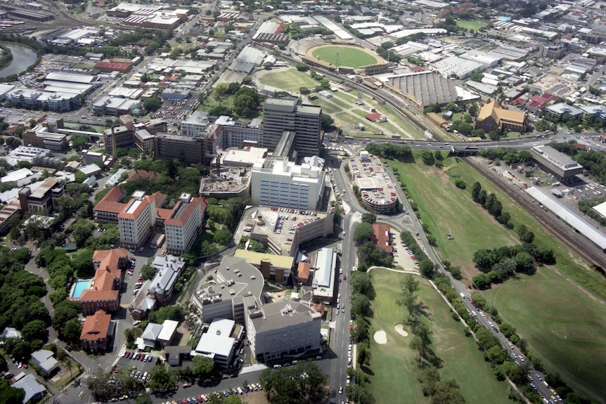 Aerial view of Herston showing Victoria Park Golf Course, the Royal Brisbane and Women's Hospital and Exhibition Grounds.
