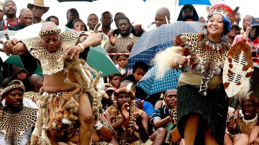 Jacob Zuma, wearing leopard skins, sings and dances with his new wife Thobeka Madiba