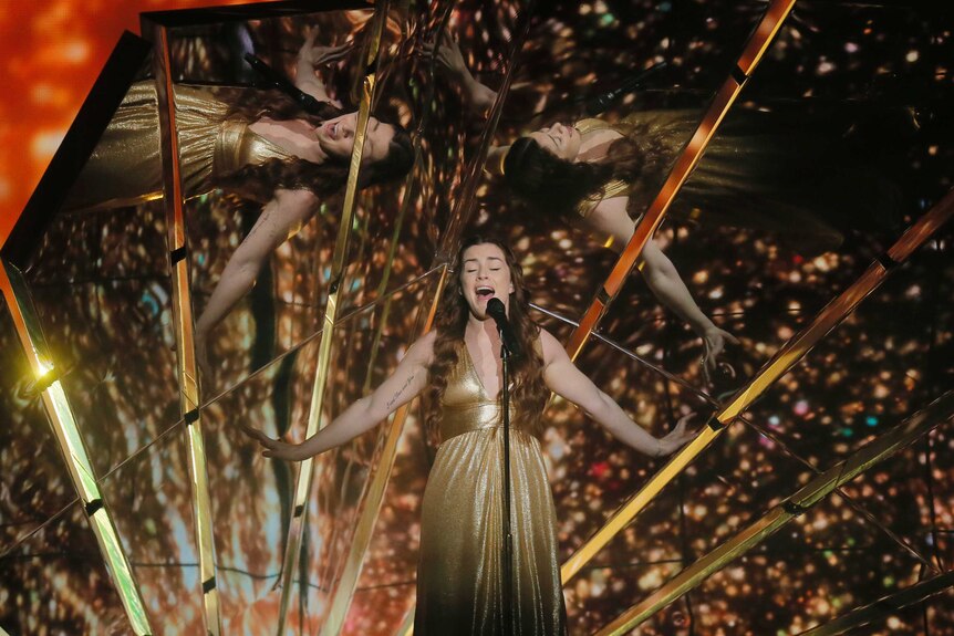 Lucie Jones from the United Kingdom performed her song, Never Give up on You wearing gold