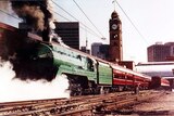 A steam train in front of the Central station clocktower