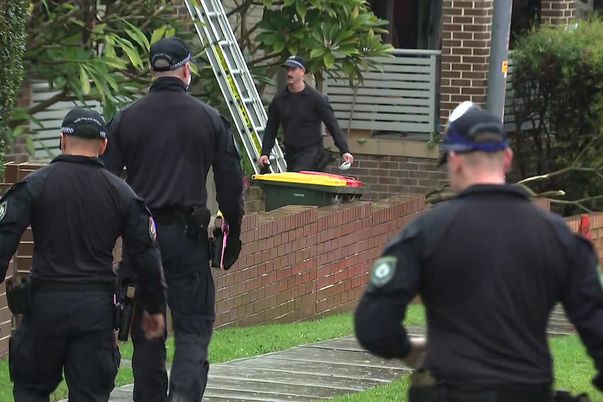 nsw police at the scene of an explosion at whalan in sydney's west