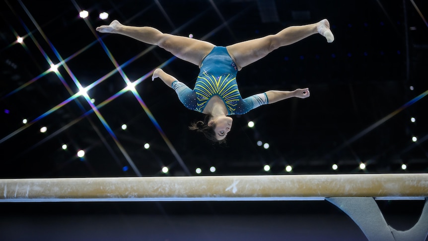 Georgia Godwin performs on the beam