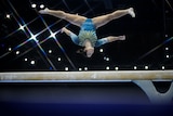 Georgia Godwin performs on the beam