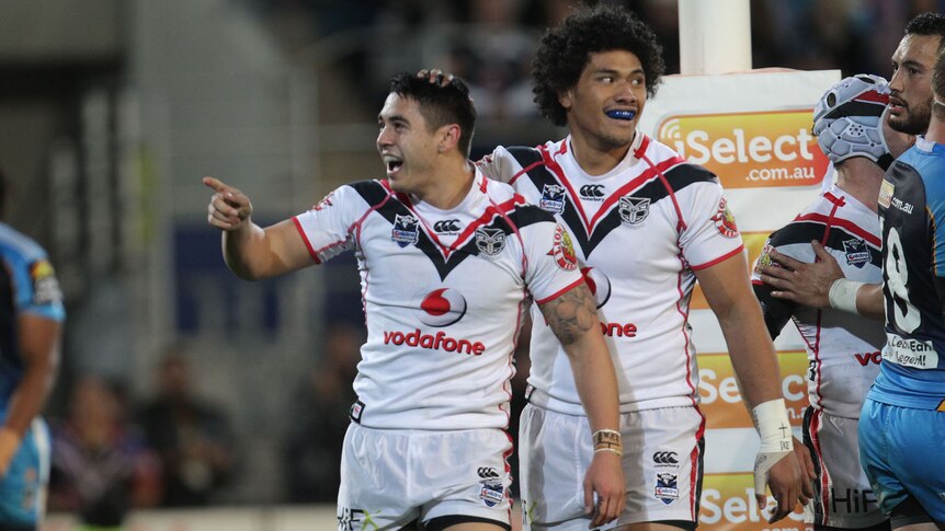 Johnson points after scoring a try