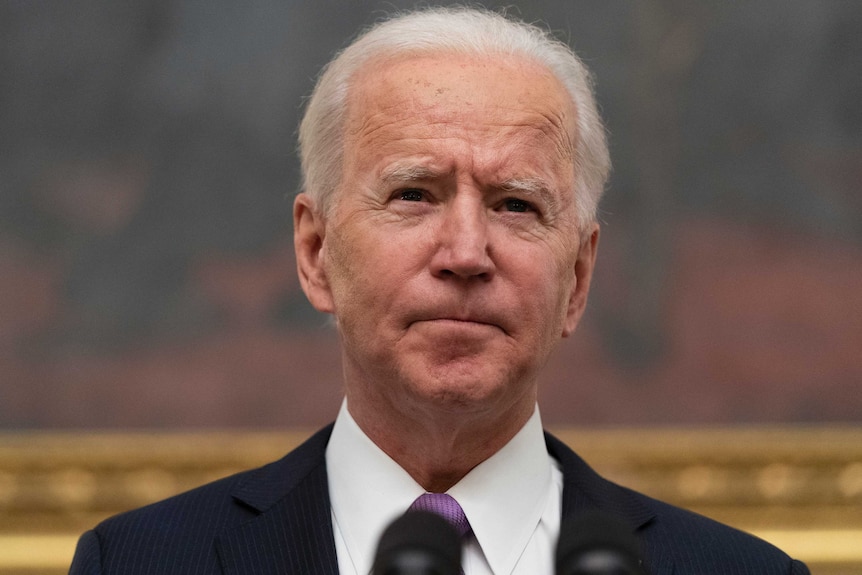 President Joe Biden speaks about the coronavirus in the State Dinning Room.