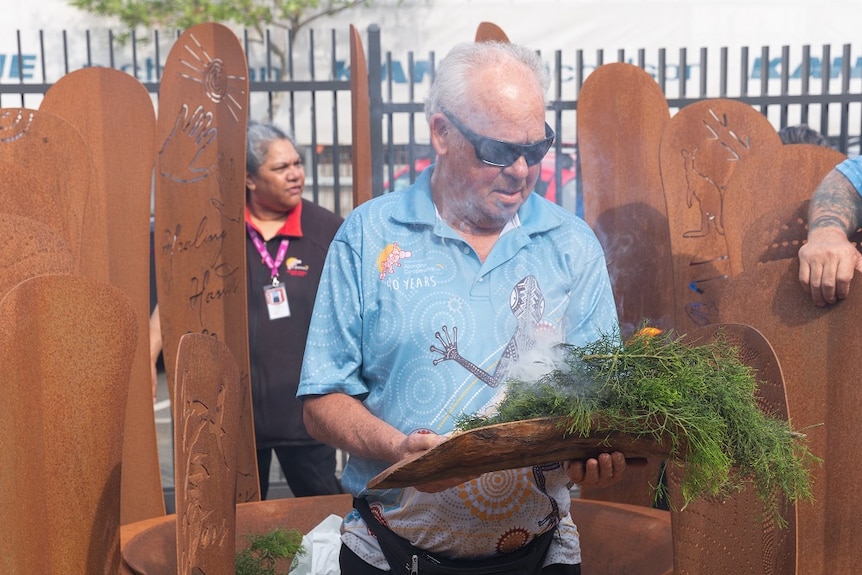 Uncle Frank Laxton in 2019 performing a smoking ceremony in Ballarat