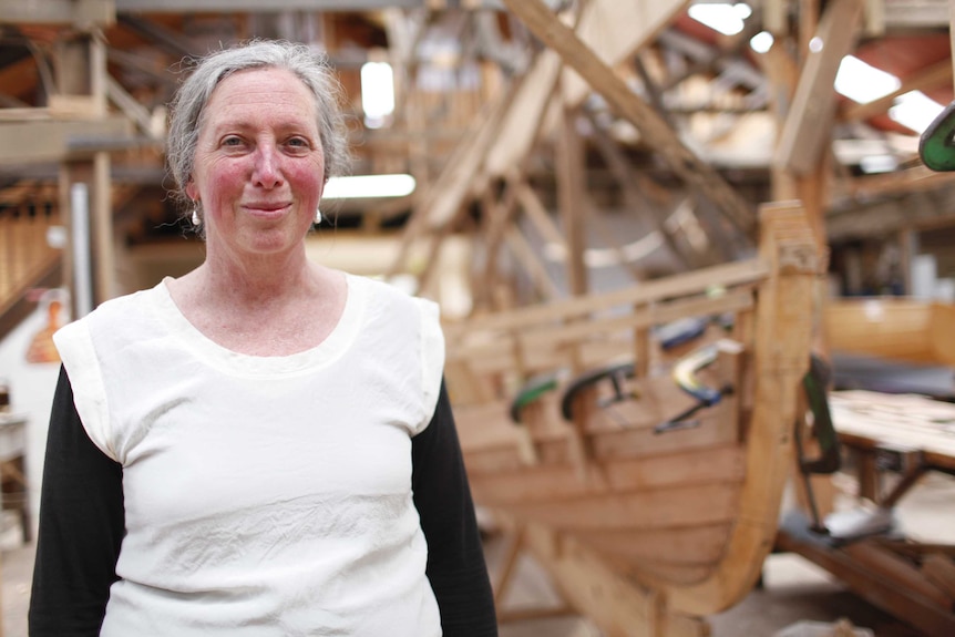Anne Holst stands in the Wooden Boat Centre