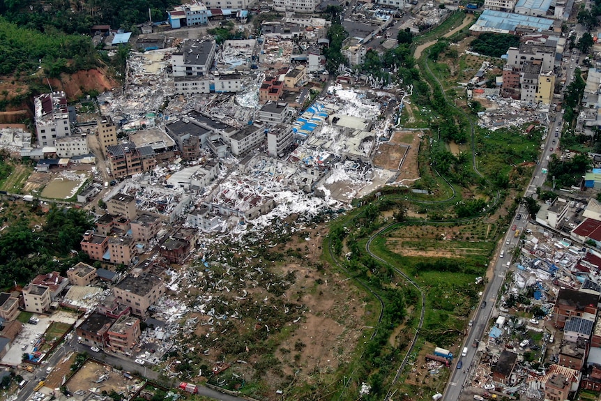Aerial photo of buildings that have been destroyed by a tornado.
