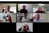 people having a coffee together via video conferencing