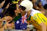 Shane Perkins kisses his wife after claiming bronze in the sprint finals.