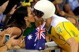 Shane Perkins kisses his wife after claiming bronze in the sprint finals.