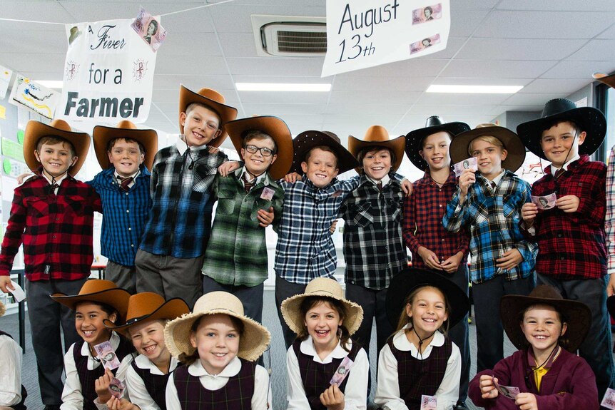 Jack Berne and his classmates, from St John the Baptist Primary School, dressed as farmers for the 'Fiver for a Farmer' campaign