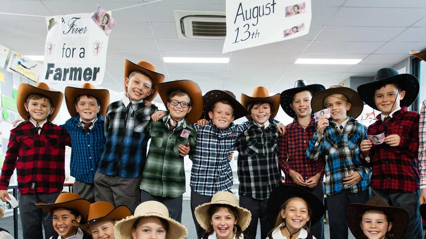 Jack Berne and his classmates, from St John the Baptist Primary School, dressed as farmers for the 'Fiver for a Farmer' campaign