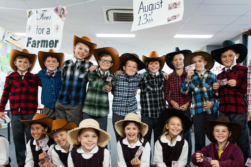 Jack Berne and his classmates, from St John the Baptist Primary School, dressed as farmers for the 'Fiver for a Farmer' campaign