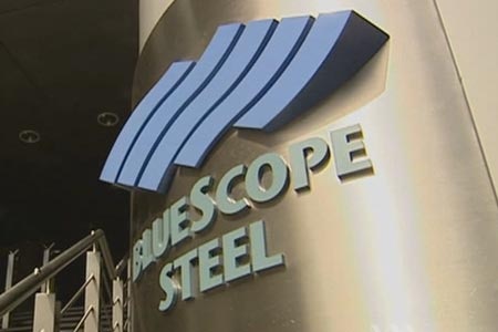 A metallic sign that reads "BlueScope Steel".