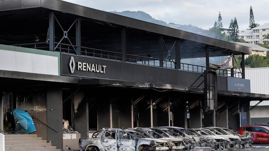 Burnt out Renault building in New Cal