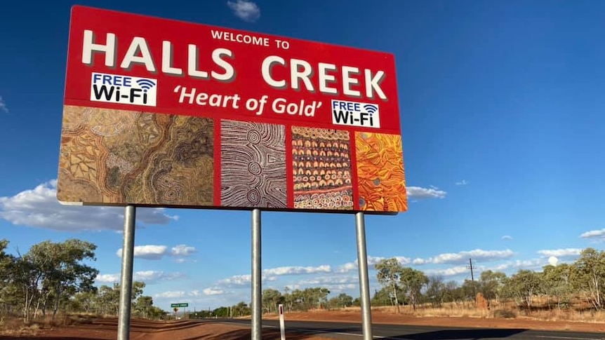 A sign saying Welcome to Halls Creek