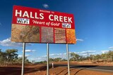 A sign saying Welcome to Halls Creek