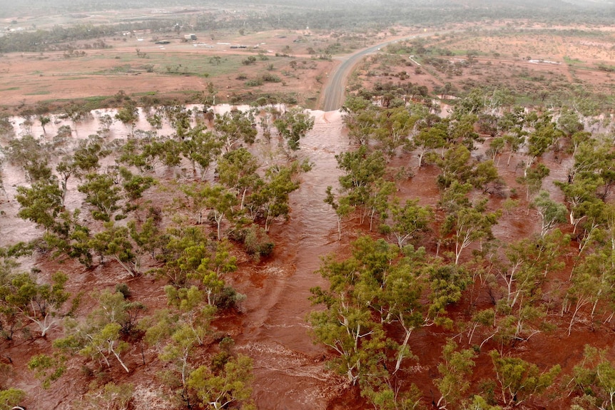 A drone photo of a flooded outback landscape.