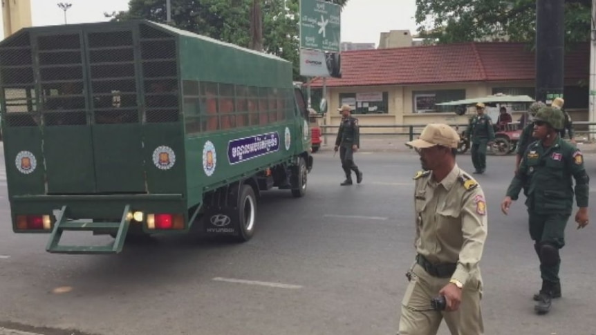 Australian filmmaker James Ricketson arrives at the Phnom Penh Municipal Court in Cambodia on Monday to answer questions about espionage charges.