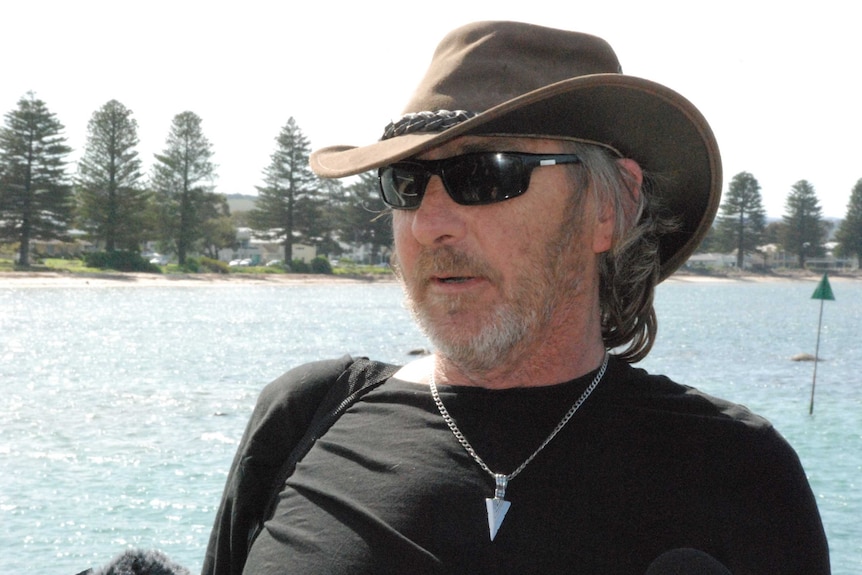 Derek Robinson in an Akubra at Victor Harbor's boat ramp