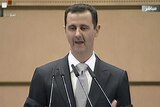 Bashar al-Assad delivers a speech