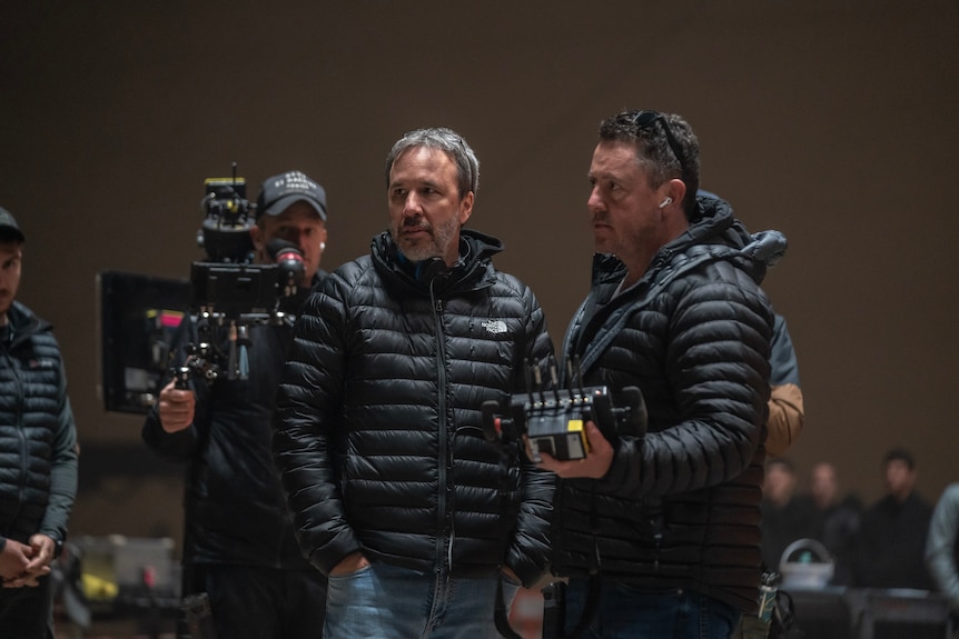 Greig Fraser with director Denis Villeneuve on the set of Dune: Part Two.