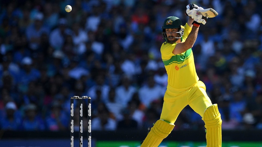 A one-day cricketer smashes the ball high through the air, square of the wicket.