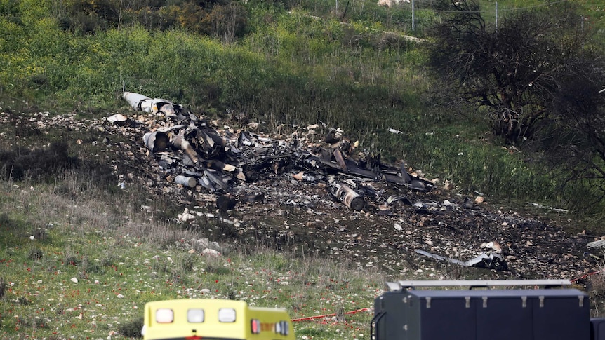 Jet wreckage in flames in northern Israel, pilot injured