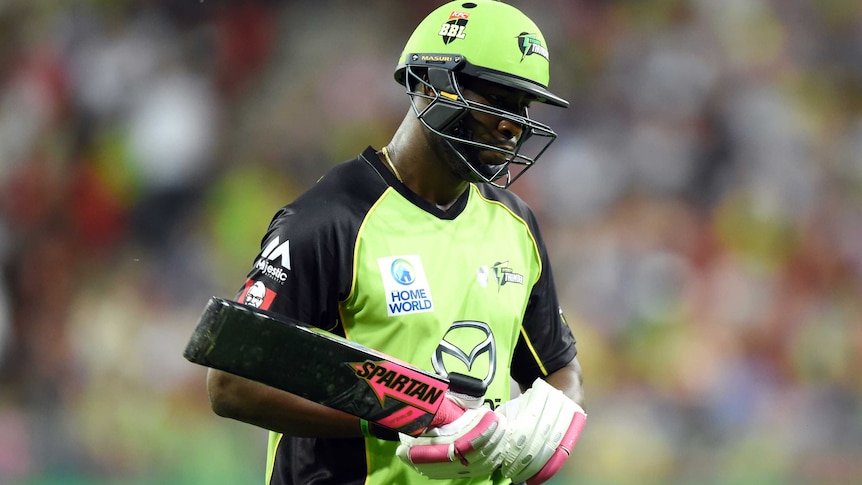Sydney Thunder's Andre Russell loses his wicket in BBL match against Sydney Sixers.