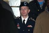 Bradley Manning is escorted from his hearing.