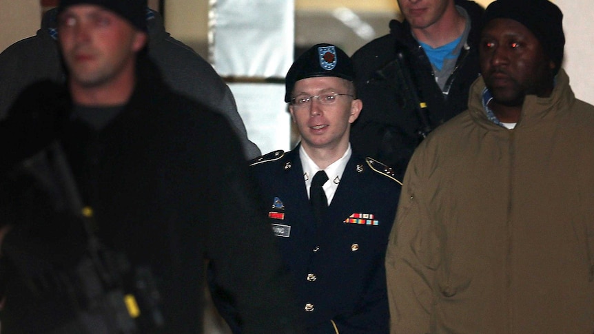 Bradley Manning is escorted from his hearing.