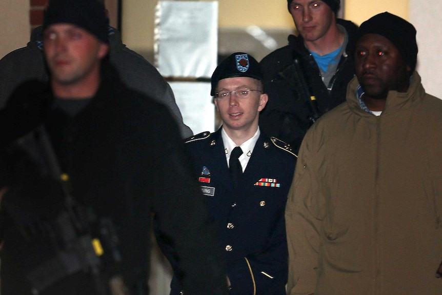 Bradley Manning is escorted from his hearing.