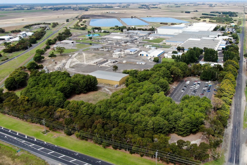 Aerial shot of an extensive complex of buildings and carparks