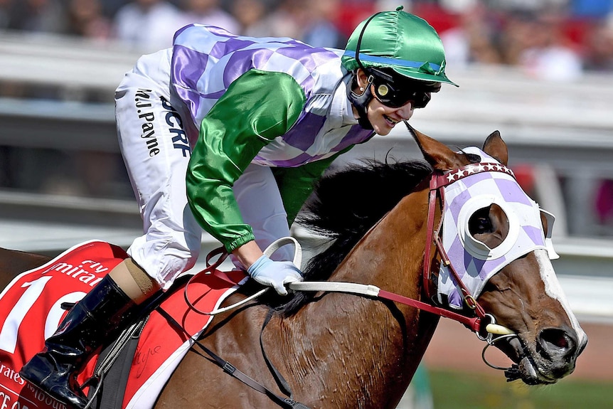 Jockey Michelle Payne riding Prince Of Penzance wins the 2015 Melbourne Cup at Flemington.
