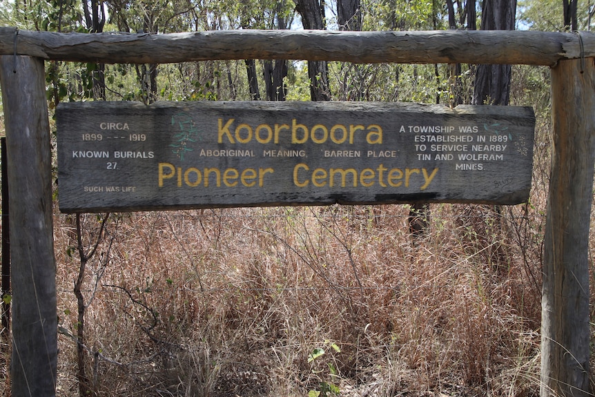 An old wooden sign announcing the Koorboora pioneer cemetery.
