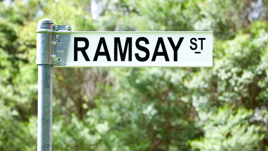 A street sign saying 'Ramsay Street'.
