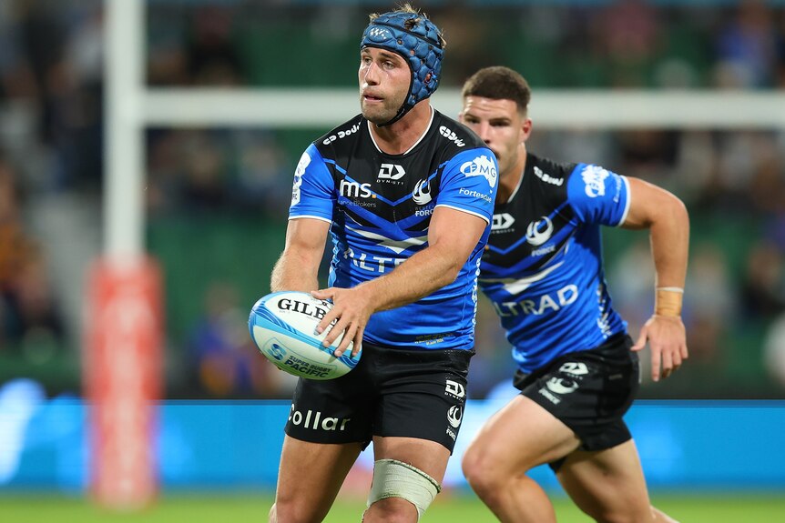 A Western Force player passes to his right during a Super Rugby Pacific match in 2024.